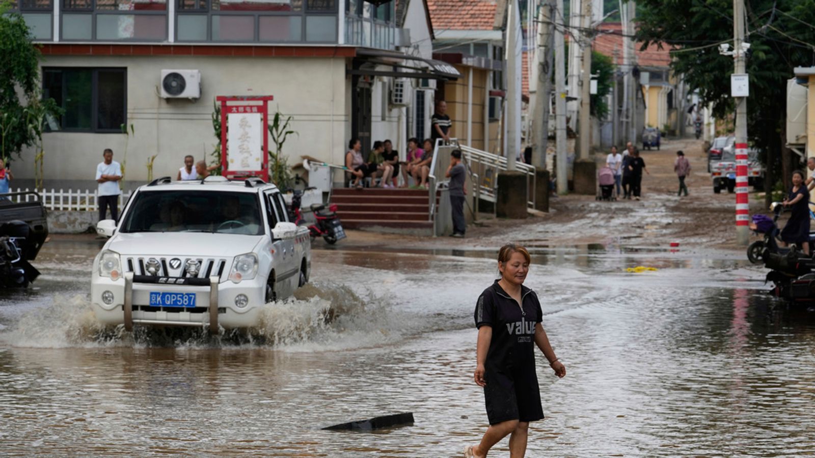 China floods: At least 30 killed in Beijing and 80,000 evacuated | World News
