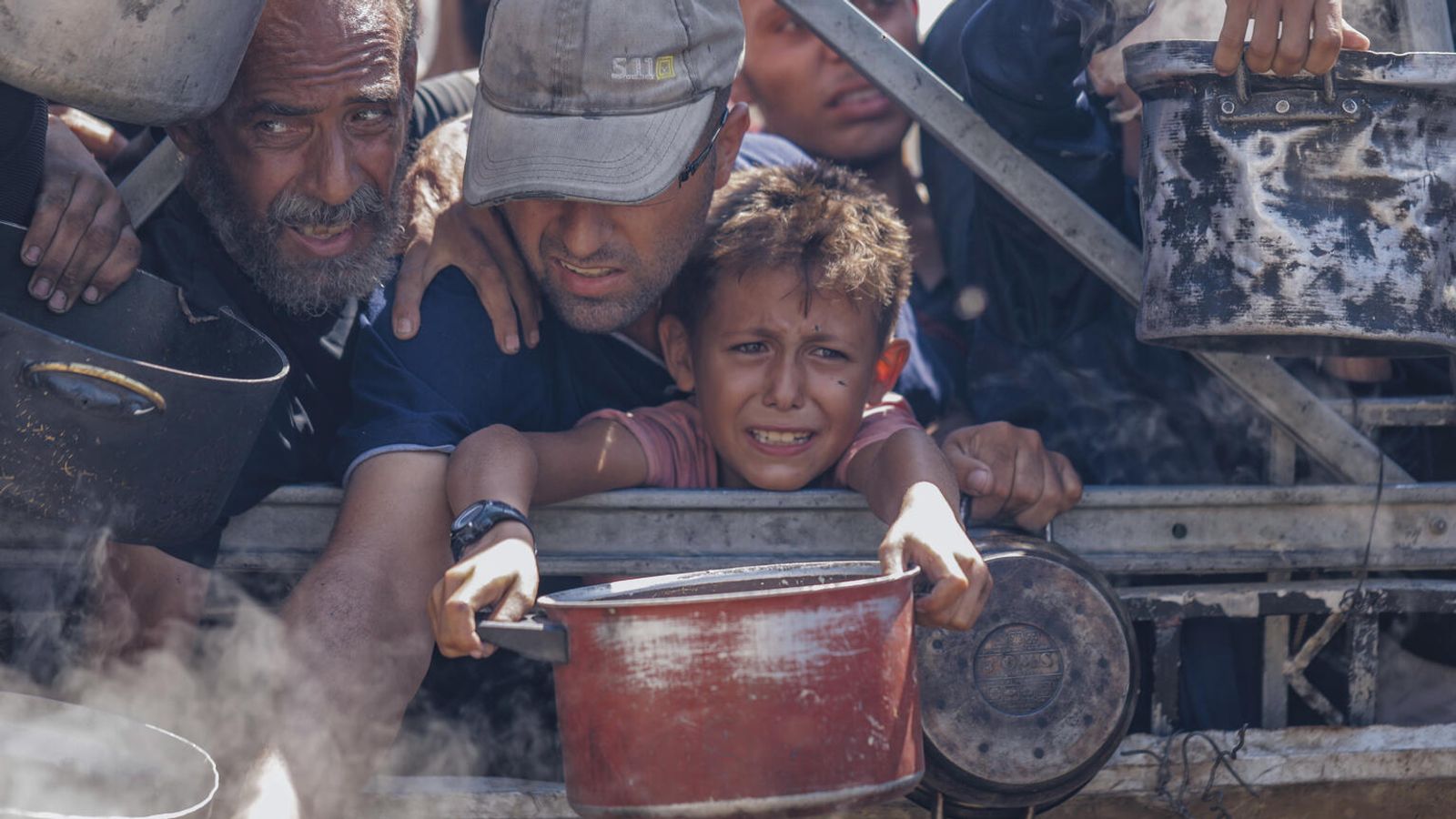 Children ‘eating out of piles of garbage’ as Gaza aid trickles in | World News
